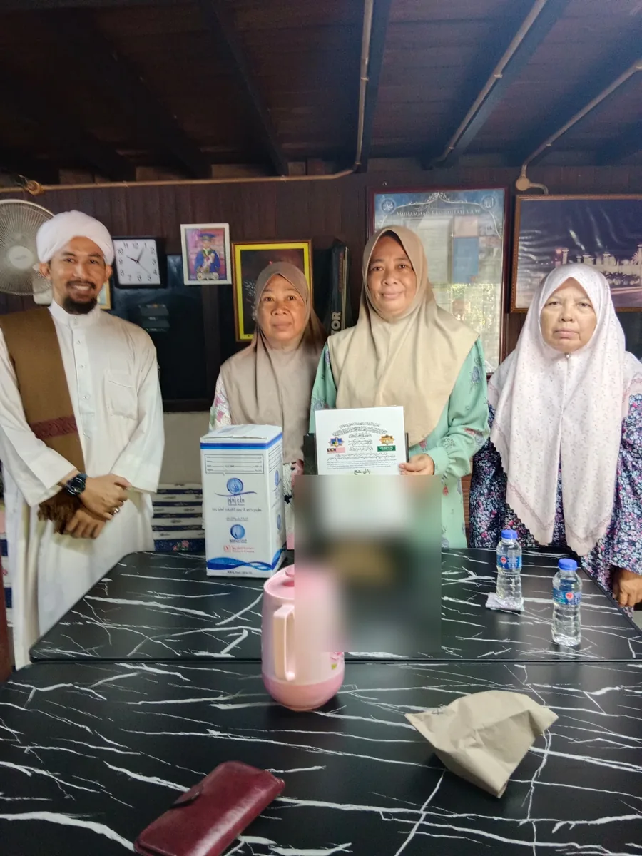 Keluarga pelanggan bersama wakil Munajat Haramain